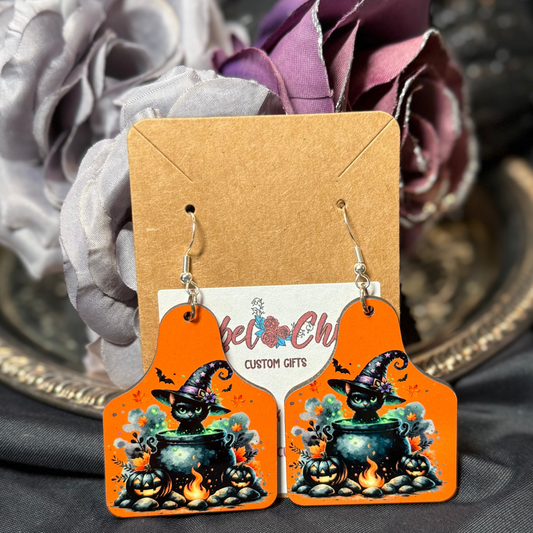 Cat in a Cauldron Cow Tag Earrings